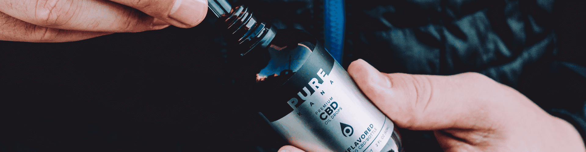 Woman using PureKana CBD products