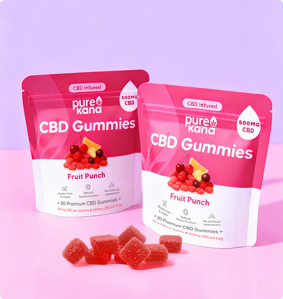 Two bags of PureKana CBD Gummies in Fruit Punch with loose gummies